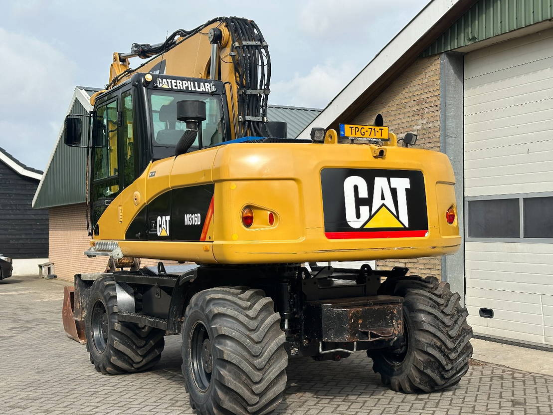 Caterpillar M316D - Pelle sur pneus: photos 3 Caterpillar M316D - Pelle sur pneus: photos 3