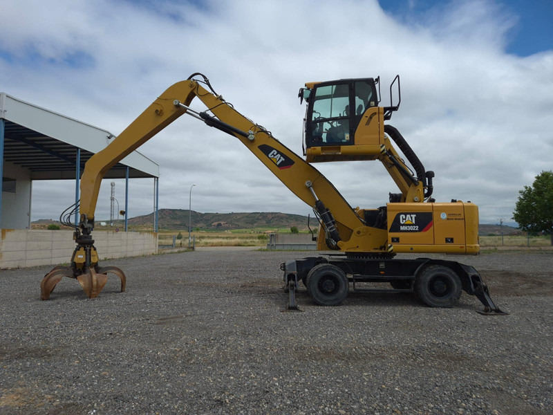 Caterpillar MH3022 - Pelle sur pneus: photos 1 Caterpillar MH3022 - Pelle sur pneus: photos 1