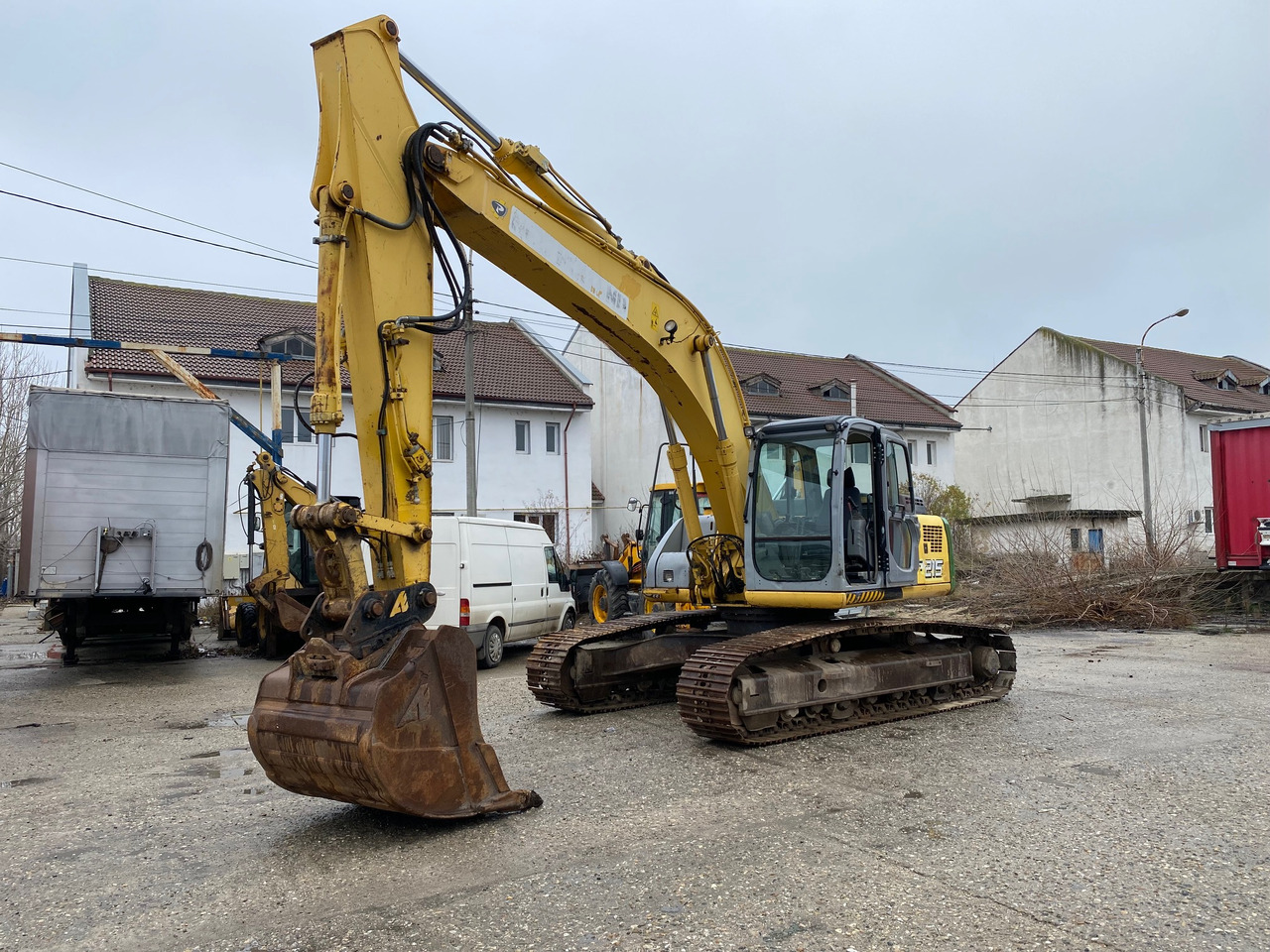 New Holland Kobelco E 215 22 T Klima - Pelle sur chenille: photos 1 New Holland Kobelco E 215 22 T Klima - Pelle sur chenille: photos 1