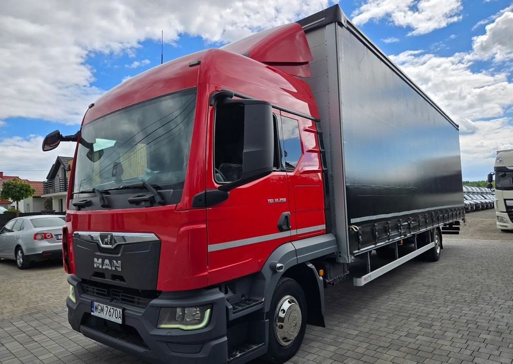 MAN TGL 12.250 - Camion à rideaux coulissants: photos 4 MAN TGL 12.250 - Camion à rideaux coulissants: photos 4