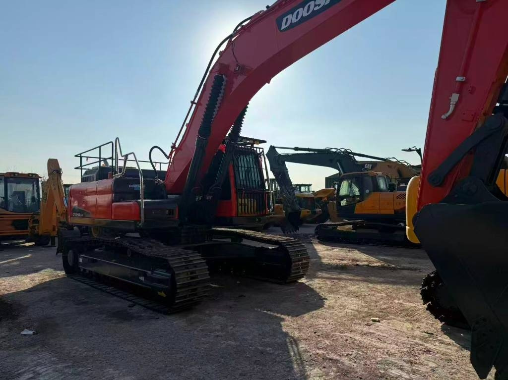 Doosan DX345LC-9C - Pelle sur chenille: photos 1 Doosan DX345LC-9C - Pelle sur chenille: photos 1