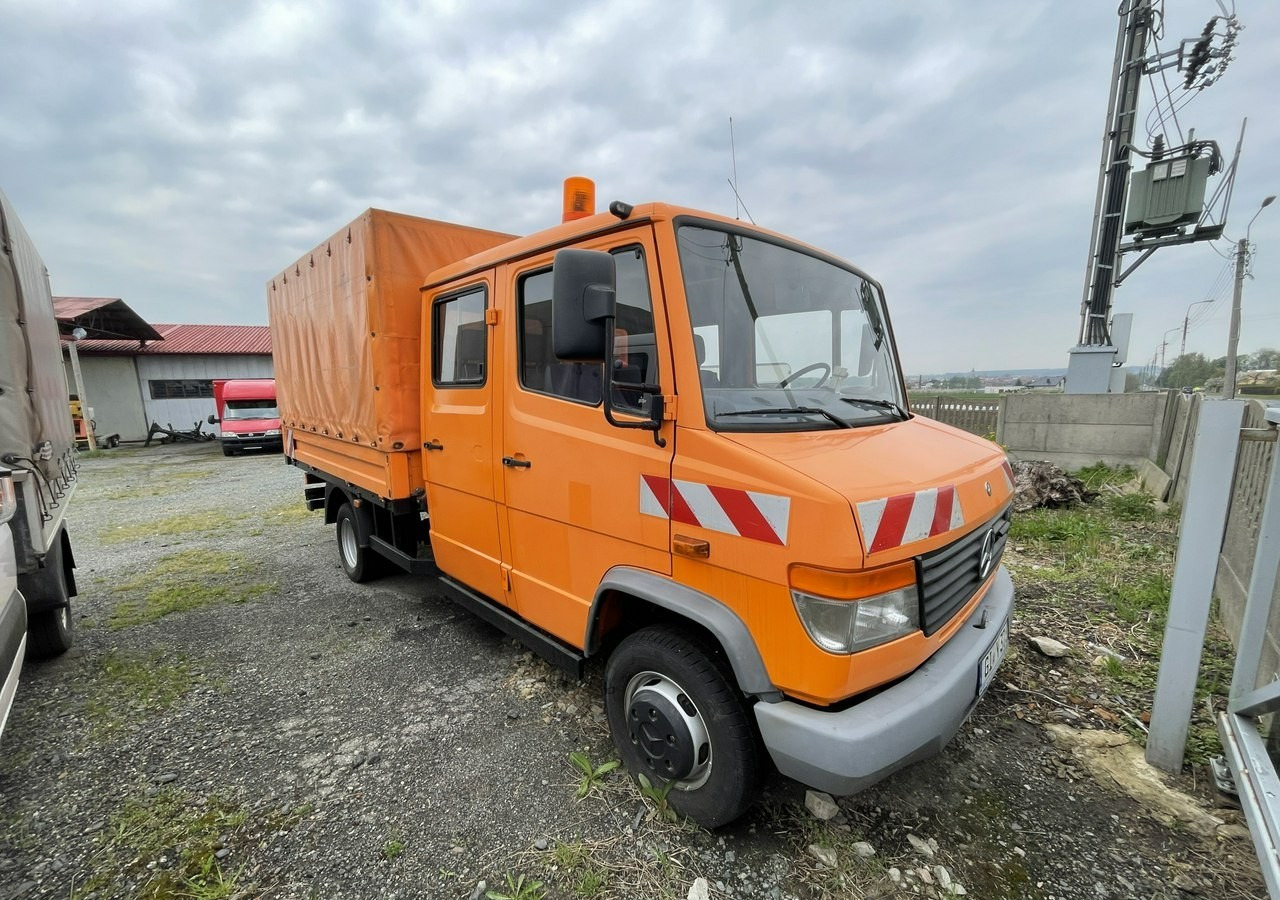 Mercedes-Benz Inny Mercedes-Benz Vario 614 Brygadówka skrzynia plandeka 6-oso doka dokka 2004 - Camion à rideaux coulissants: photos 1 Mercedes-Benz Inny Mercedes-Benz Vario 614 Brygadówka skrzynia plandeka 6-oso doka dokka 2004 - Camion à rideaux coulissants: photos 1