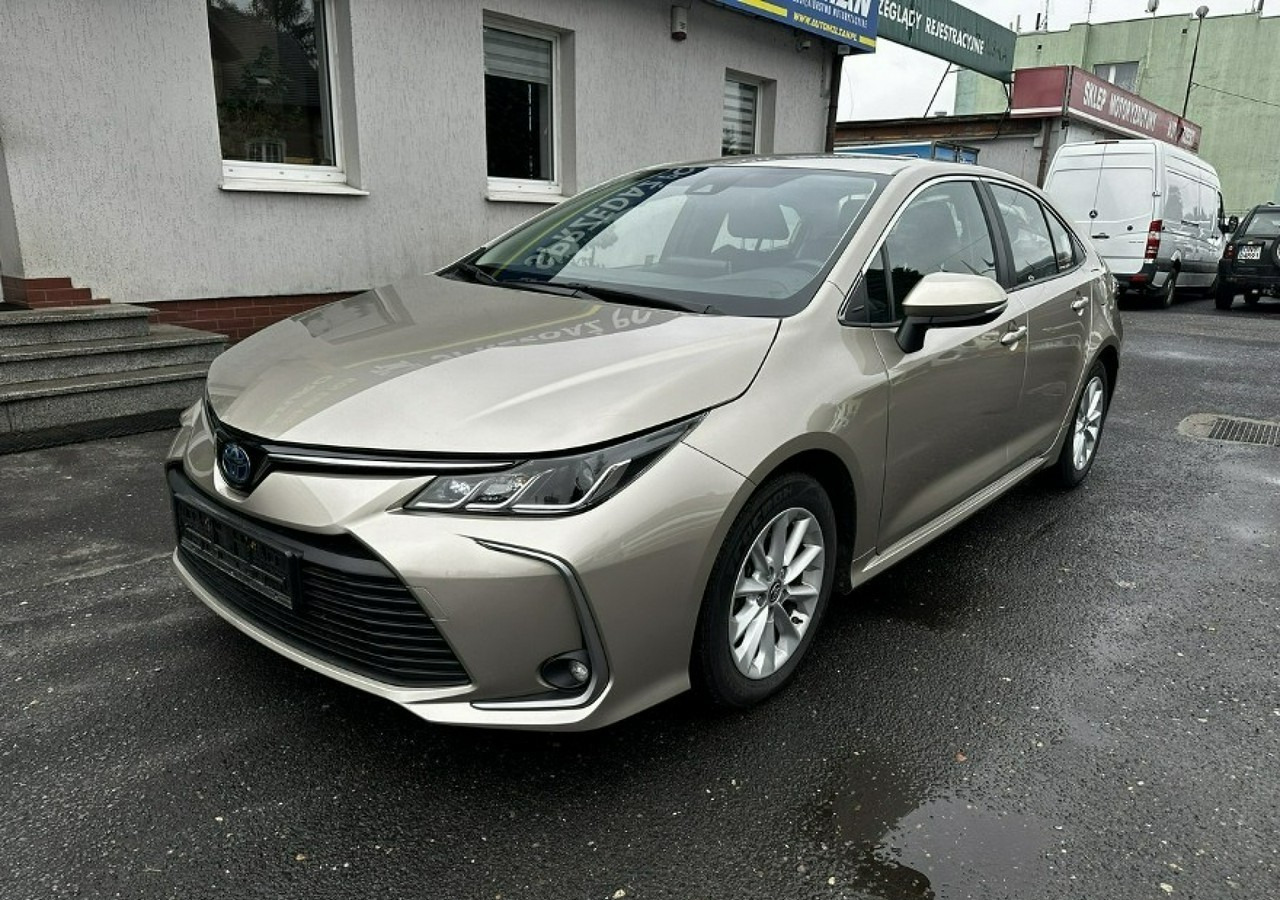 Toyota Corolla XII Corolla Sedan 1.8 Hybrid 98KM Comfort Salon PL 2022 - Berline: photos 2 Toyota Corolla XII Corolla Sedan 1.8 Hybrid 98KM Comfort Salon PL 2022 - Berline: photos 2