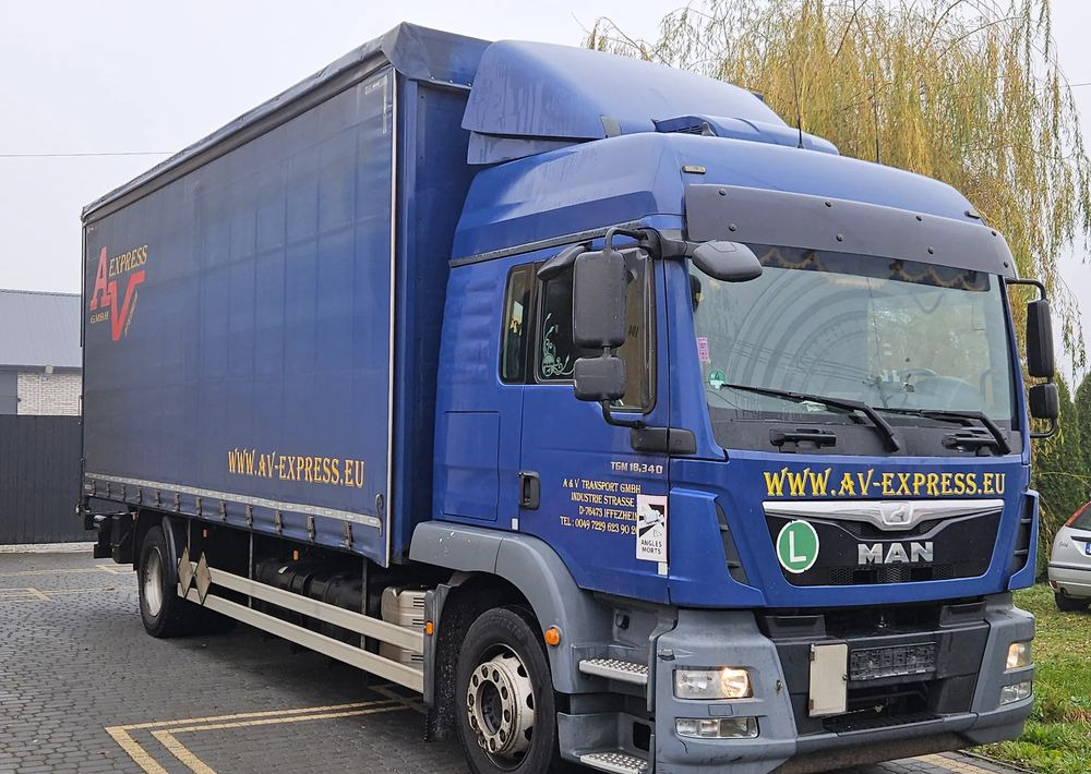 MAN TGM 18.340 / FIRANKA / SPROWADZONY / 9100 ŁADOWNOŚĆ / 18 PALET / E6 / WINDA / - Camion à rideaux coulissants: photos 2 MAN TGM 18.340 / FIRANKA / SPROWADZONY / 9100 ŁADOWNOŚĆ / 18 PALET / E6 / WINDA / - Camion à rideaux coulissants: photos 2