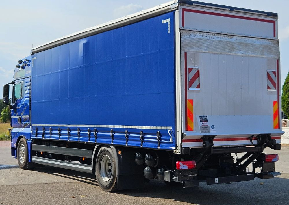 MAN TGX 18.430 / FIRANKA / WINDA / KLIMA POSTOJOWA / 300TYŚ PRZEBIEG / 2020 /E6 / KLIMA POSTOJOWA / SPROWADZONY / JAK NOWY / AUTOMAT - Camion à rideaux coulissants: photos 5 MAN TGX 18.430 / FIRANKA / WINDA / KLIMA POSTOJOWA / 300TYŚ PRZEBIEG / 2020 /E6 / KLIMA POSTOJOWA / SPROWADZONY / JAK NOWY / AUTOMAT - Camion à rideaux coulissants: photos 5