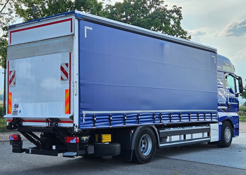 MAN TGX 18.430 / FIRANKA / WINDA / KLIMA POSTOJOWA / 300TYŚ PRZEBIEG / 2020 /E6 / KLIMA POSTOJOWA / SPROWADZONY / JAK NOWY / AUTOMAT - Camion à rideaux coulissants: photos 4 MAN TGX 18.430 / FIRANKA / WINDA / KLIMA POSTOJOWA / 300TYŚ PRZEBIEG / 2020 /E6 / KLIMA POSTOJOWA / SPROWADZONY / JAK NOWY / AUTOMAT - Camion à rideaux coulissants: photos 4