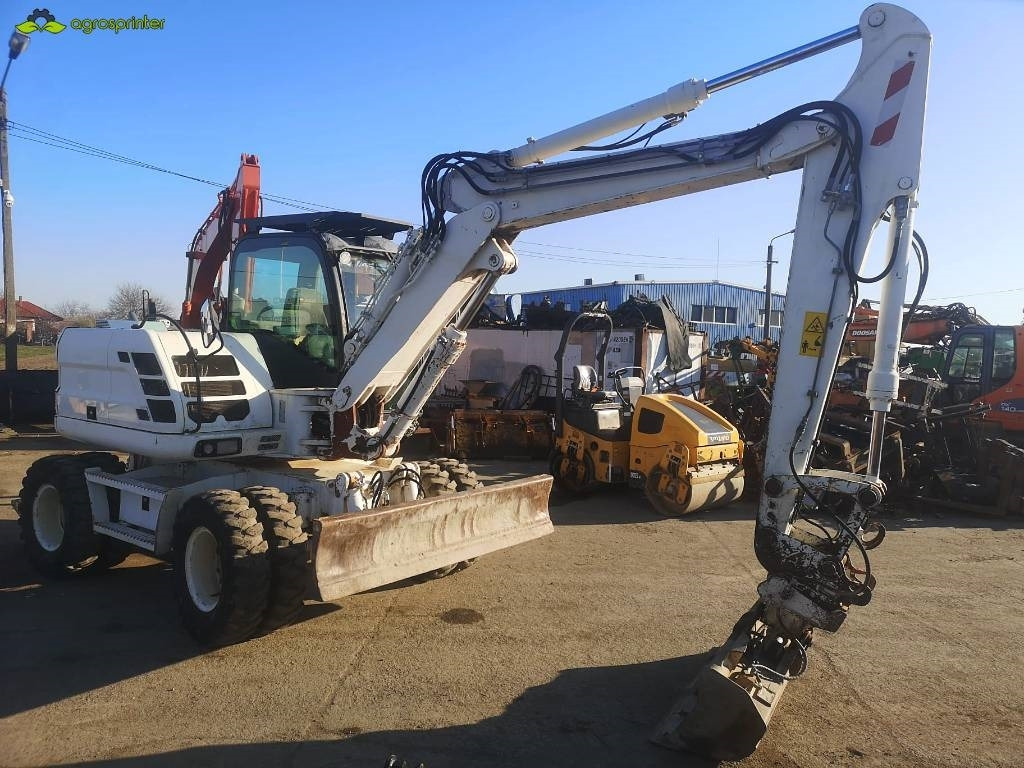 Case WX 125 - Pelle sur pneus: photos 2 Case WX 125 - Pelle sur pneus: photos 2