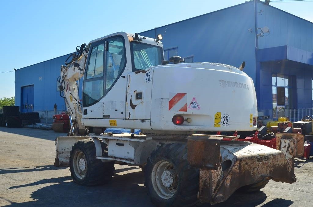 Case WX 145 - Pelle sur pneus: photos 3 Case WX 145 - Pelle sur pneus: photos 3