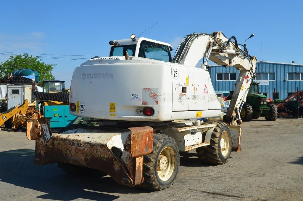 Case WX 145 - Pelle sur pneus: photos 4 Case WX 145 - Pelle sur pneus: photos 4