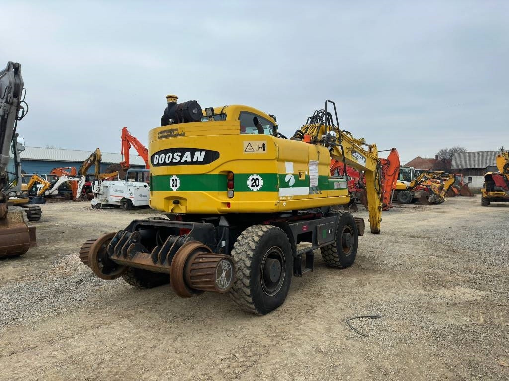 Doosan DX 160 WR - Pelle sur pneus: photos 5 Doosan DX 160 WR - Pelle sur pneus: photos 5