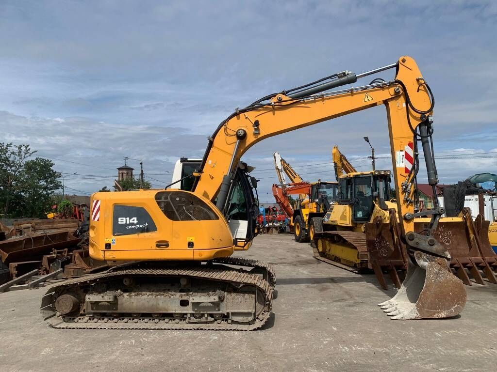 Liebherr R 914 Compact Litronic Liebherr R 914 Compact Litronic - Pelle sur pneus: photos 3 Liebherr R 914 Compact Litronic Liebherr R 914 Compact Litronic - Pelle sur pneus: photos 3