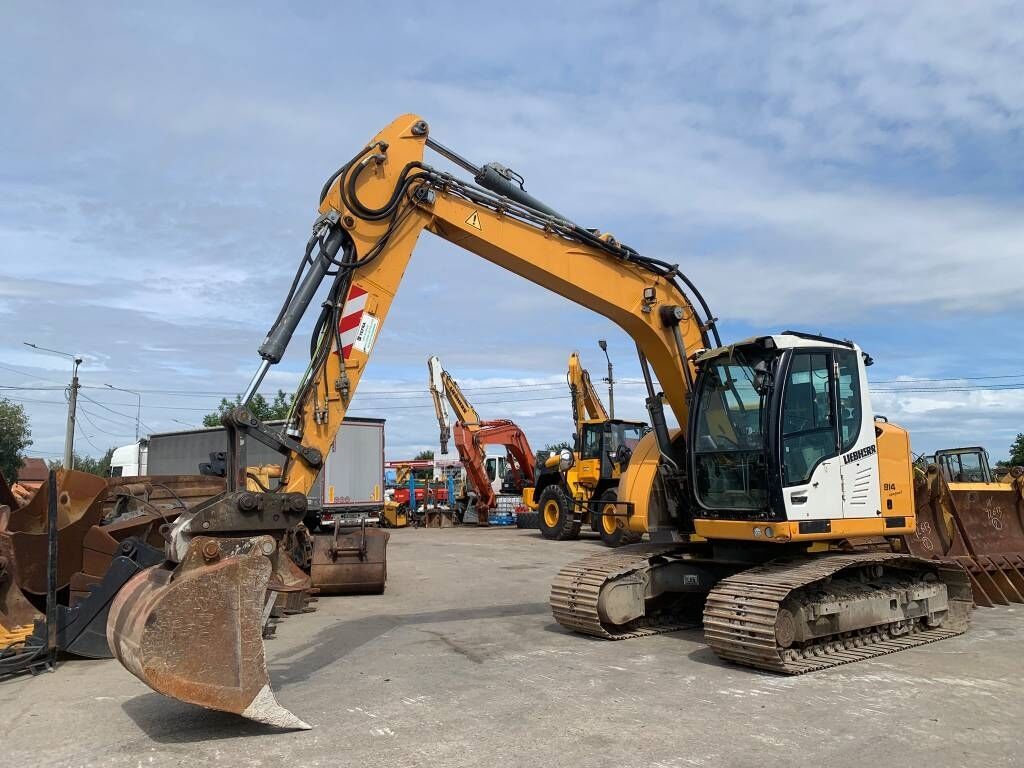 Liebherr R 914 Compact Litronic Liebherr R 914 Compact Litronic - Pelle sur pneus: photos 1 Liebherr R 914 Compact Litronic Liebherr R 914 Compact Litronic - Pelle sur pneus: photos 1