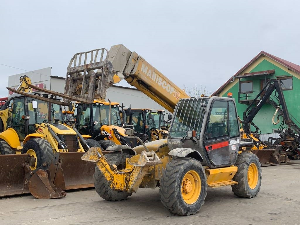 Manitou MT 1233 S - Chariot télescopique: photos 1 Manitou MT 1233 S - Chariot télescopique: photos 1