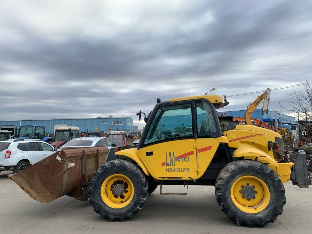 New Holland LM 410 - Chariot télescopique: photos 5 New Holland LM 410 - Chariot télescopique: photos 5