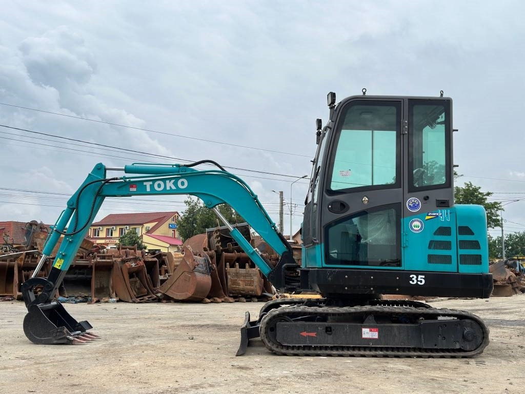 Toko 35 - Mini pelle: photos 2 Toko 35 - Mini pelle: photos 2