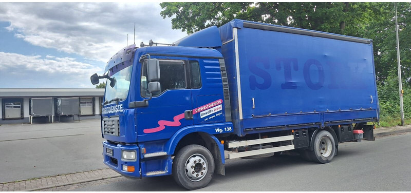 MAN 12.250 TGM - Camion à rideaux coulissants: photos 1 MAN 12.250 TGM - Camion à rideaux coulissants: photos 1
