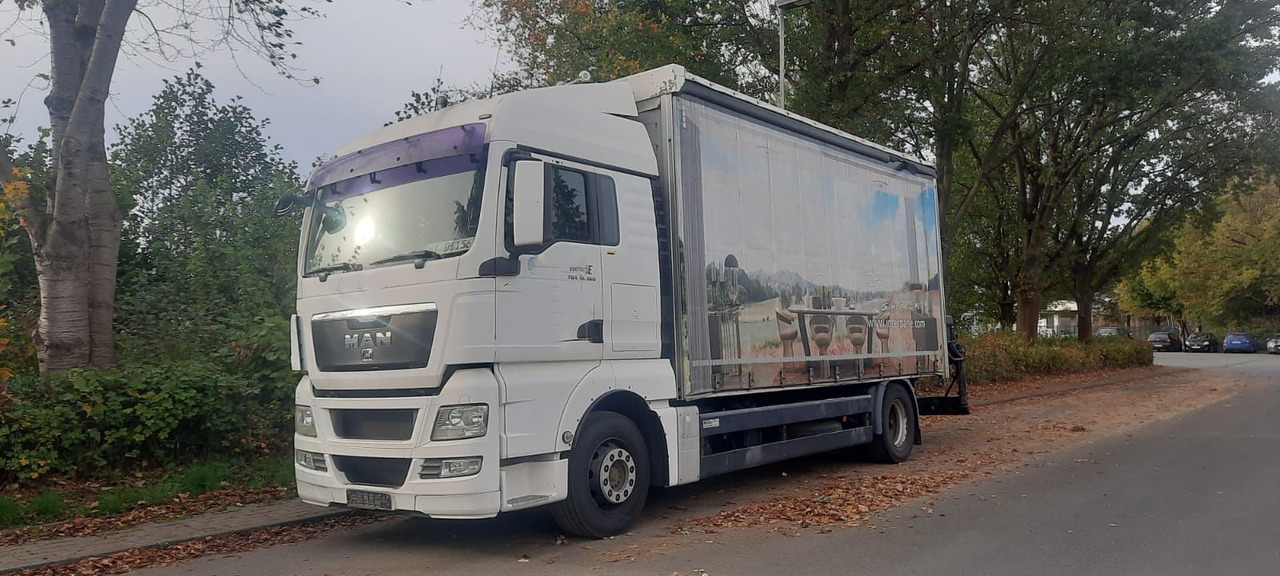 MAN TGX 18.360PS 4x2 G.Haus Kran+Funk - Camion à rideaux coulissants, Camion grue: photos 1 MAN TGX 18.360PS 4x2 G.Haus Kran+Funk - Camion à rideaux coulissants, Camion grue: photos 1