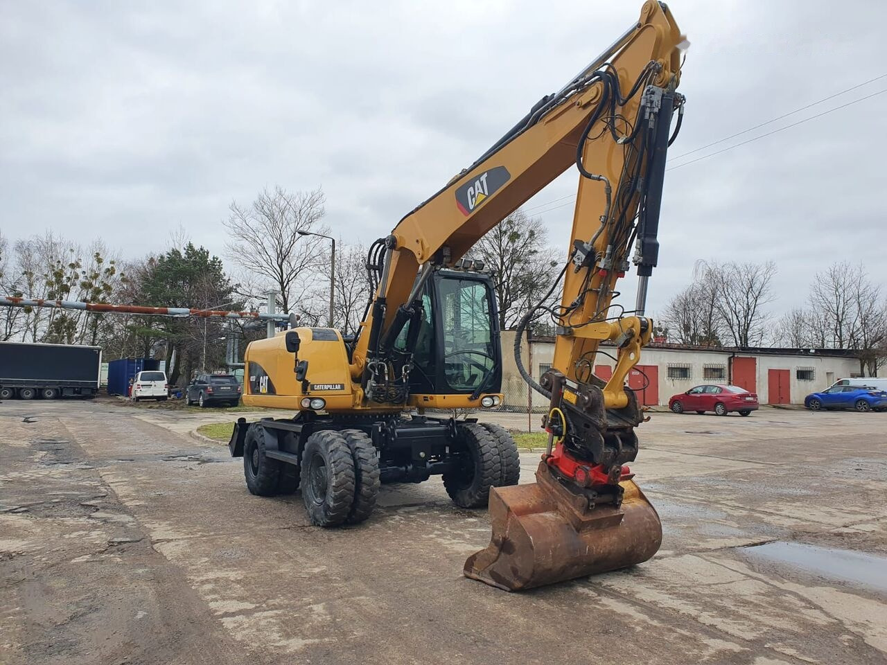 Caterpillar M 313 D Tiltrotator - Pelle sur pneus: photos 5 Caterpillar M 313 D Tiltrotator - Pelle sur pneus: photos 5