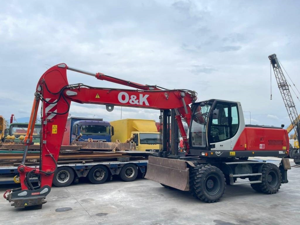 O&K MH 6.6 - Pelle sur pneus: photos 4 O&K MH 6.6 - Pelle sur pneus: photos 4