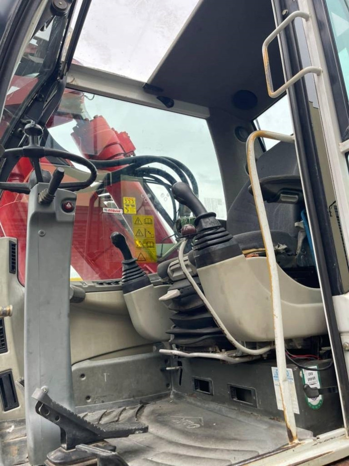 O&K MH 6.6 - Pelle sur pneus: photos 5 O&K MH 6.6 - Pelle sur pneus: photos 5