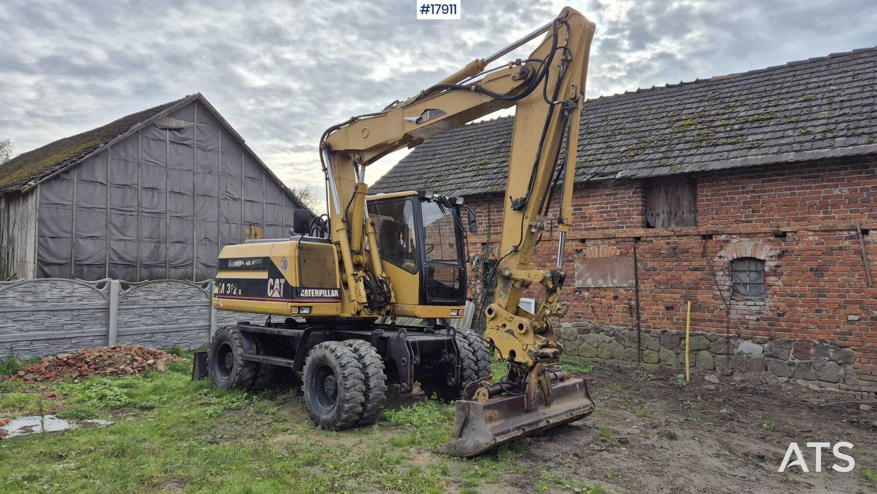 2000 CAT M312 - Pelle sur pneus: photos 1 2000 CAT M312 - Pelle sur pneus: photos 1