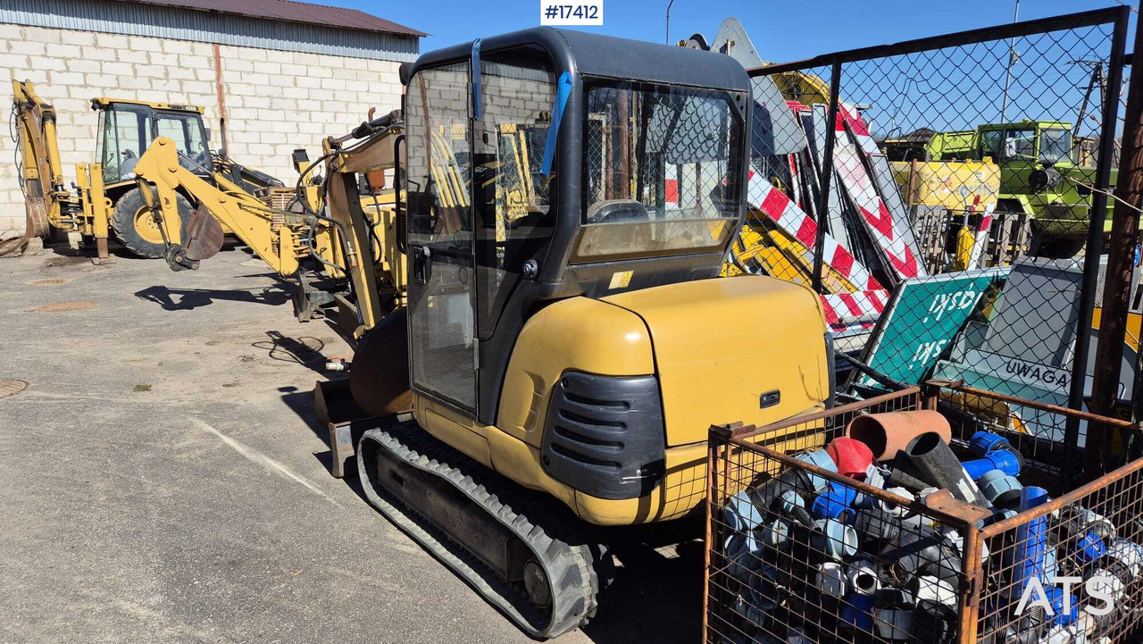 Mini excavator CATERPILLAR 302.5 (2004) two buckets, quick couplers. - Mini pelle: photos 5 Mini excavator CATERPILLAR 302.5 (2004) two buckets, quick couplers. - Mini pelle: photos 5