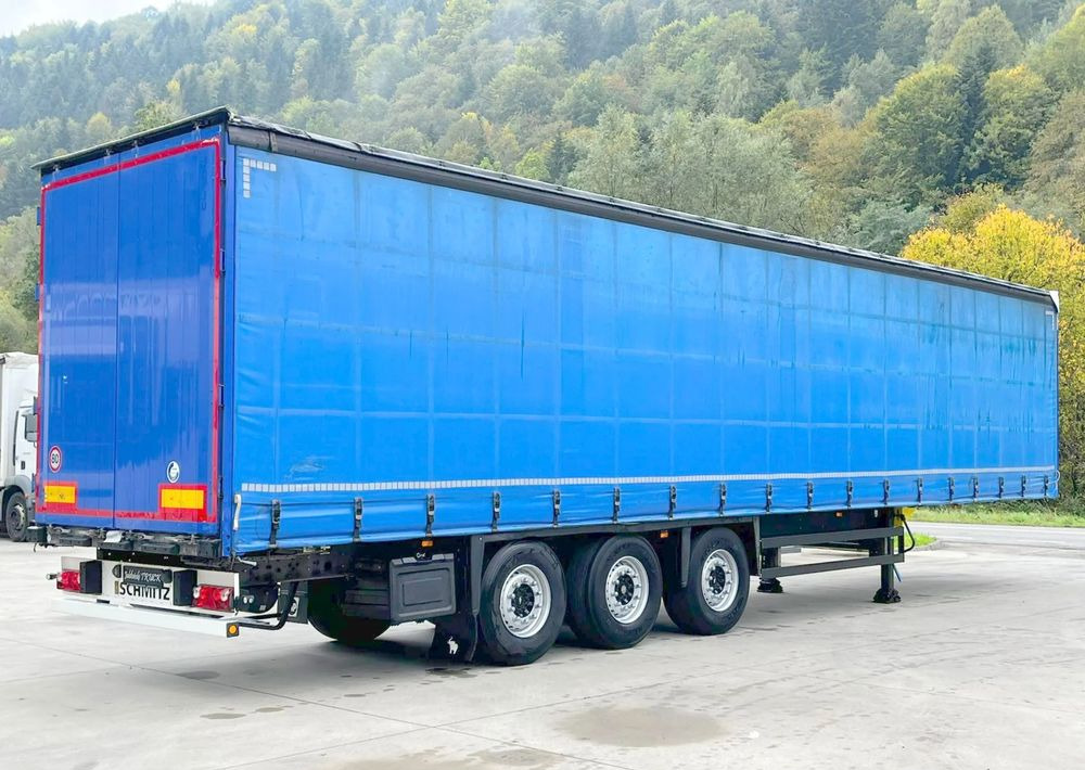 Schmitz Cargobull Firanka Standard Coilmulde // 9m // Oś podnoszona // Osie Schmitz // - Semi-remorque rideaux coulissants: photos 1 Schmitz Cargobull Firanka Standard Coilmulde // 9m // Oś podnoszona // Osie Schmitz // - Semi-remorque rideaux coulissants: photos 1