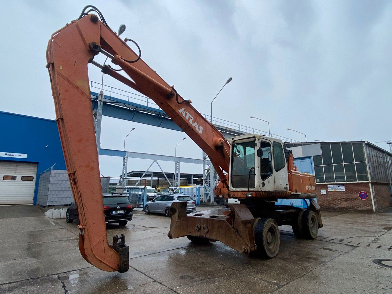 Atlas 1704 MI mit Greifer Umschlagbagger Lang - Pelle sur pneus: photos 4 Atlas 1704 MI mit Greifer Umschlagbagger Lang - Pelle sur pneus: photos 4