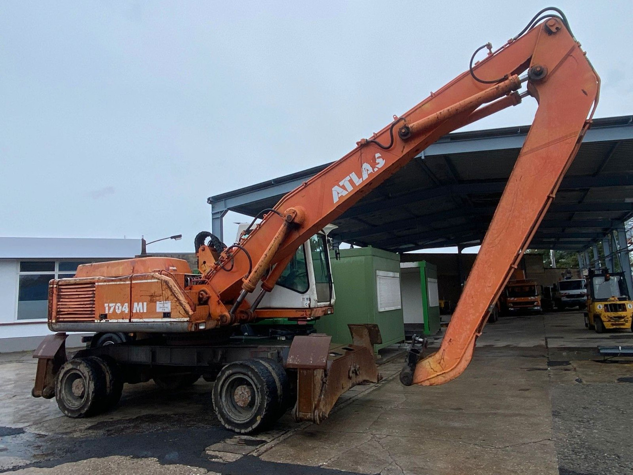 Atlas 1704 MI mit Greifer Umschlagbagger Lang - Pelle sur pneus: photos 5 Atlas 1704 MI mit Greifer Umschlagbagger Lang - Pelle sur pneus: photos 5