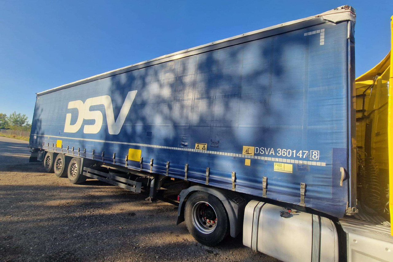 Schmitz - Semi-remorque rideaux coulissants: photos 1 Schmitz - Semi-remorque rideaux coulissants: photos 1