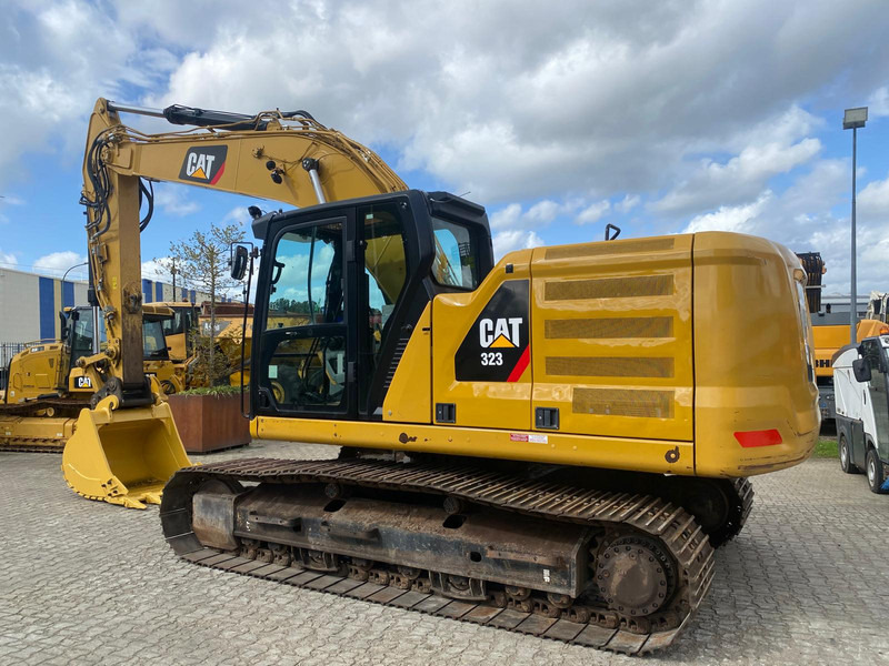 Caterpillar 323 07 (next gen) NVT - Pelle sur chenille: photos 1 Caterpillar 323 07 (next gen) NVT - Pelle sur chenille: photos 1