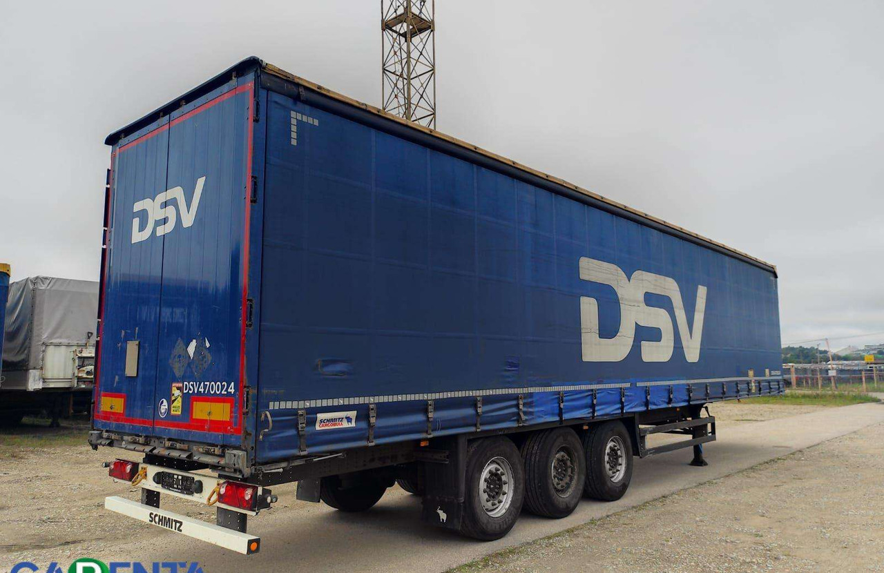 Schmitz SCB*S3T - Semi-remorque rideaux coulissants: photos 1 Schmitz SCB*S3T - Semi-remorque rideaux coulissants: photos 1
