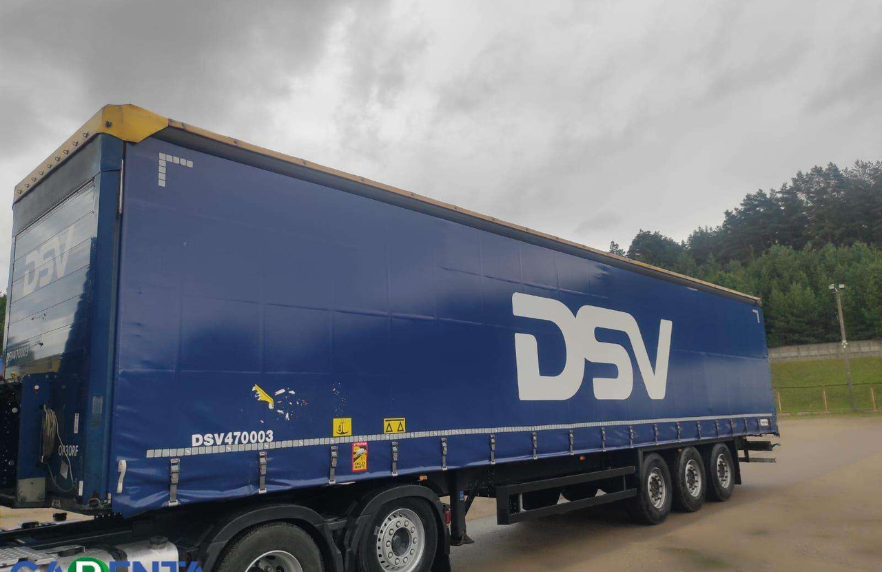 Schmitz SCB*S3T - Semi-remorque rideaux coulissants: photos 1 Schmitz SCB*S3T - Semi-remorque rideaux coulissants: photos 1