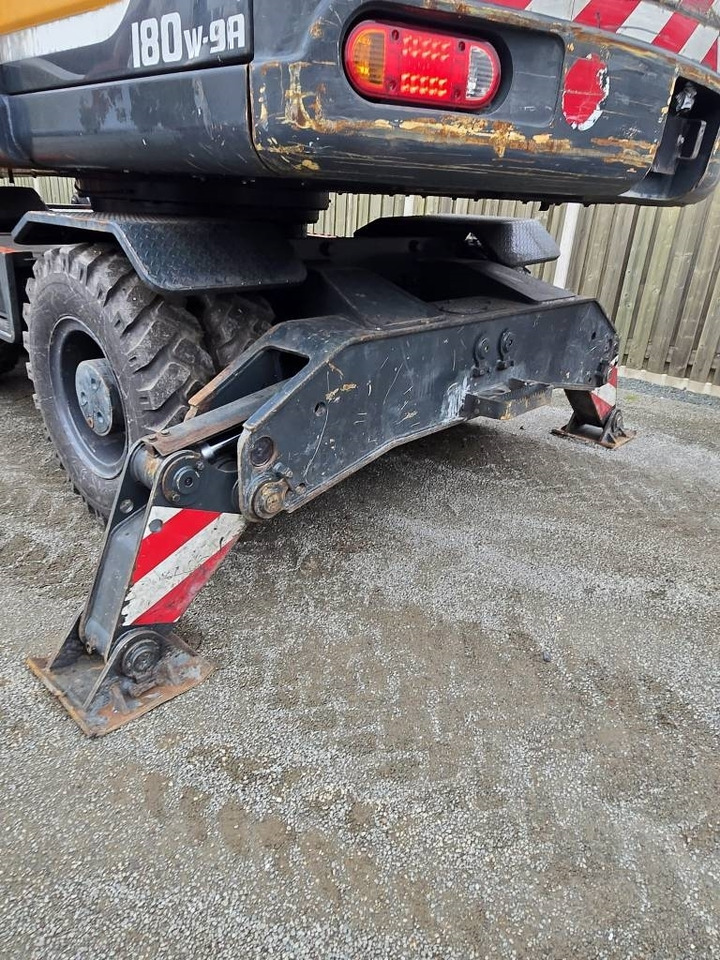 Pelle sur pneus Hyundai R 180W-9A: photos 12 Pelle sur pneus Hyundai R 180W-9A: photos 12