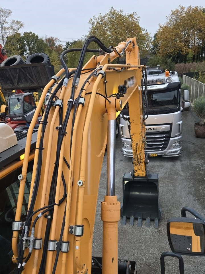 Pelle sur pneus Hyundai R 180W-9A: photos 21 Pelle sur pneus Hyundai R 180W-9A: photos 21