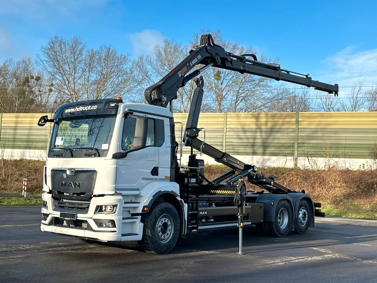 MAN TGS 26.470 6x2 Abrollkipper + Kran Hiab 138-3 - Camion ampliroll, Camion grue: photos 2 MAN TGS 26.470 6x2 Abrollkipper + Kran Hiab 138-3 - Camion ampliroll, Camion grue: photos 2