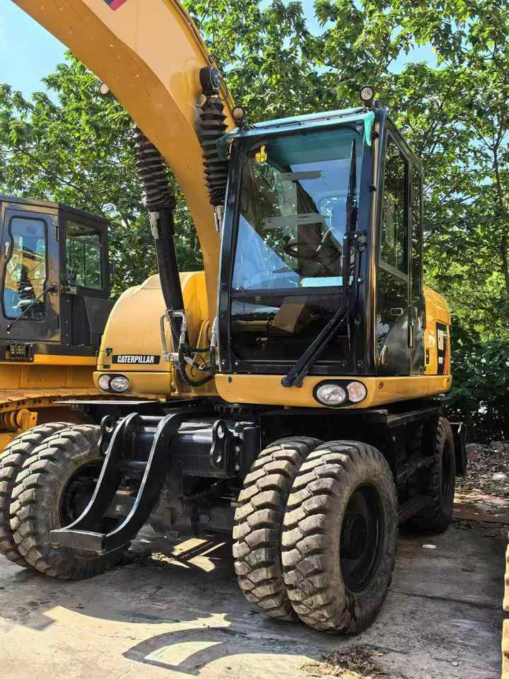 Used Caterpillar M315D2 Mini Wheel Excavator With Core Components for Diggers and Excavators - Pelle sur pneus: photos 2 Used Caterpillar M315D2 Mini Wheel Excavator With Core Components for Diggers and Excavators - Pelle sur pneus: photos 2