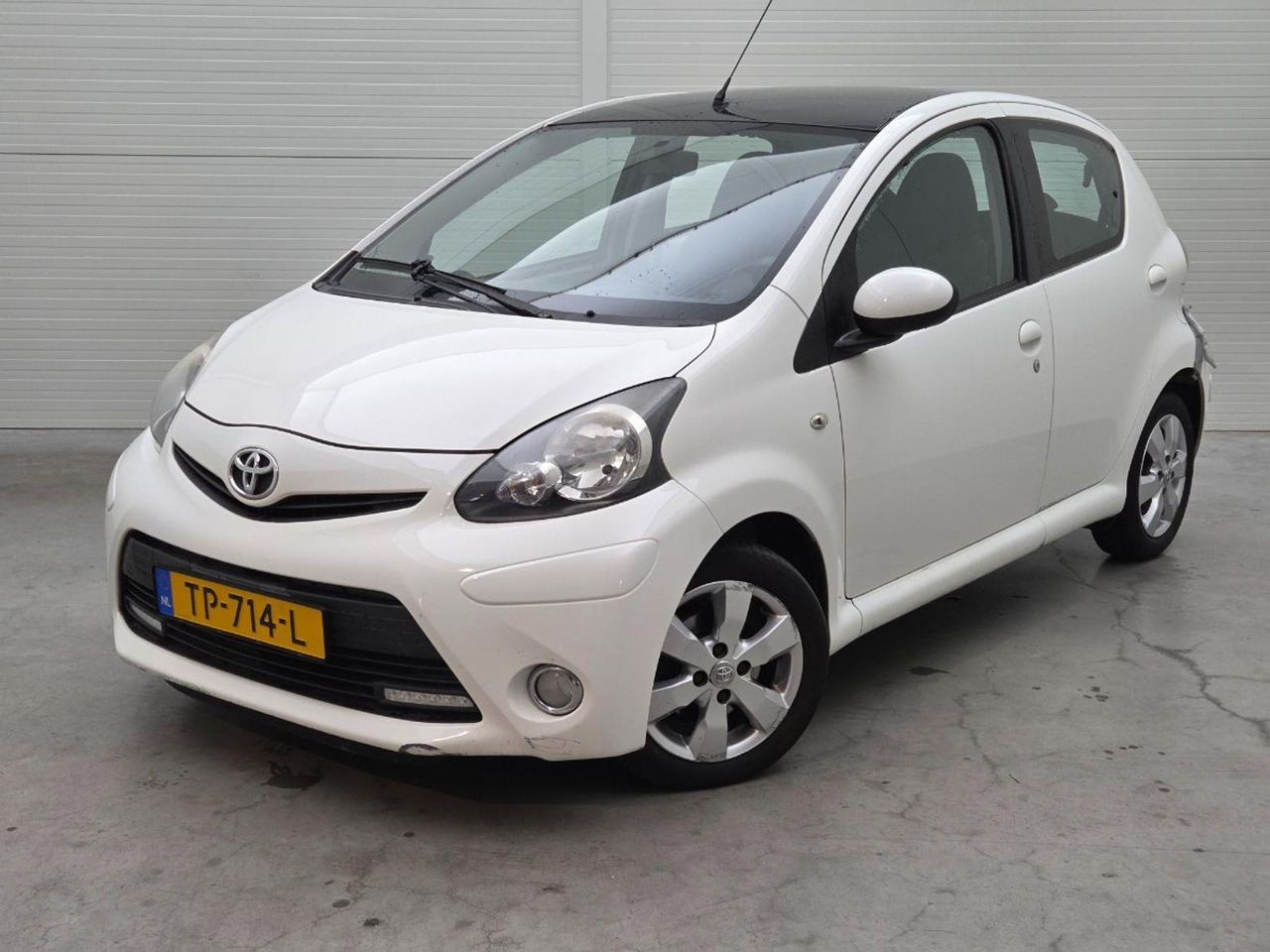 Toyota Aygo 1.0 VVT - i Now | 2014 | 131.940 km | TP714L | NAP: Geen oordeel - Voiture à hayon: photos 1 Toyota Aygo 1.0 VVT - i Now | 2014 | 131.940 km | TP714L | NAP: Geen oordeel - Voiture à hayon: photos 1