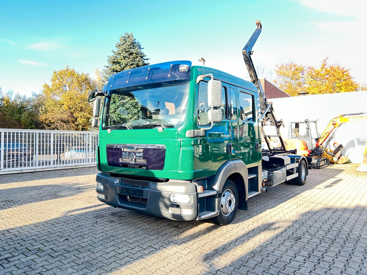 MAN 12.250 Doppelkabine Abroller - Camion ampliroll: photos 2 MAN 12.250 Doppelkabine Abroller - Camion ampliroll: photos 2