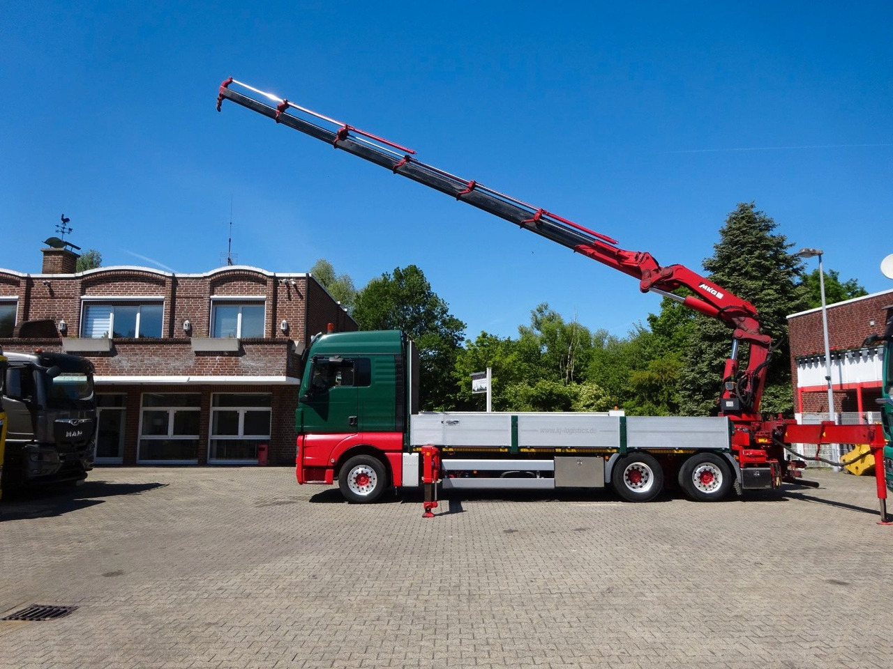 MAN 26.480 TGX + MKG HLK531 Kran +Lift-Lenkachse - Camion plateau, Camion grue: photos 2 MAN 26.480 TGX + MKG HLK531 Kran +Lift-Lenkachse - Camion plateau, Camion grue: photos 2