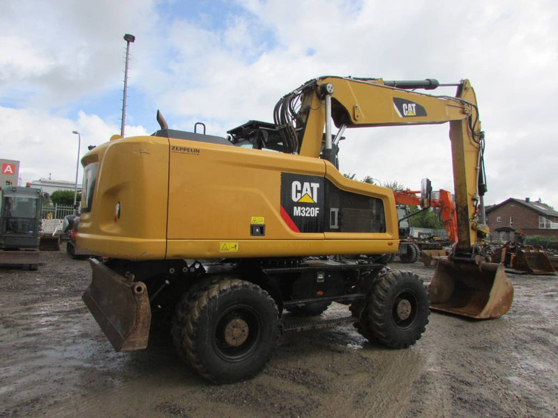 Cat M 320 F Mobilbagger 69.500 EUR / AC - Pelle sur pneus: photos 5 Cat M 320 F Mobilbagger 69.500 EUR / AC - Pelle sur pneus: photos 5