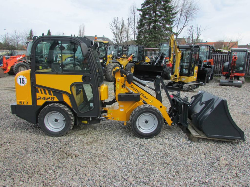 Schäffer 2428 SLT Schmalspur Radlader 32.500 - Chargeuse compacte sur chenilles: photos 1 Schäffer 2428 SLT Schmalspur Radlader 32.500 - Chargeuse compacte sur chenilles: photos 1