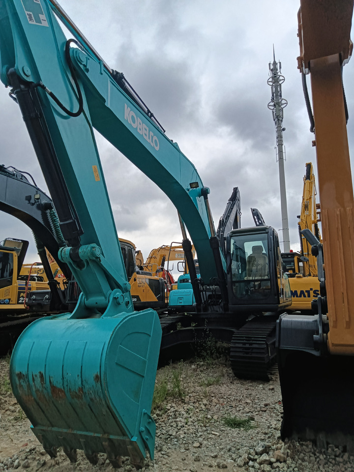 Pelle sur chenille KOBELCO SK 210: photos 11