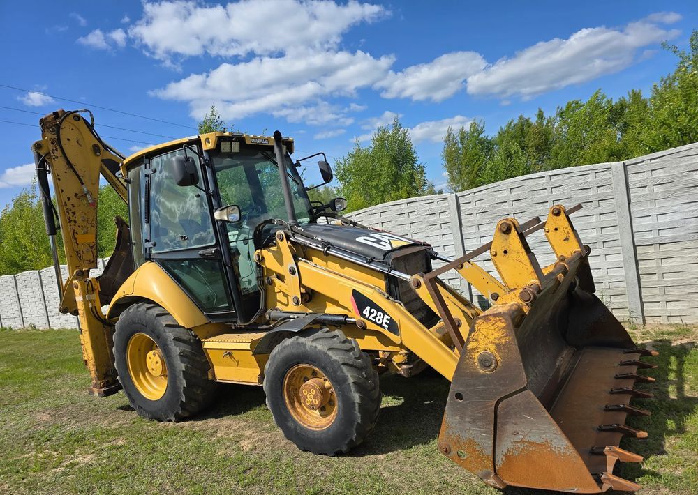 Caterpillar - Tractopelle: photos 1 Caterpillar - Tractopelle: photos 1