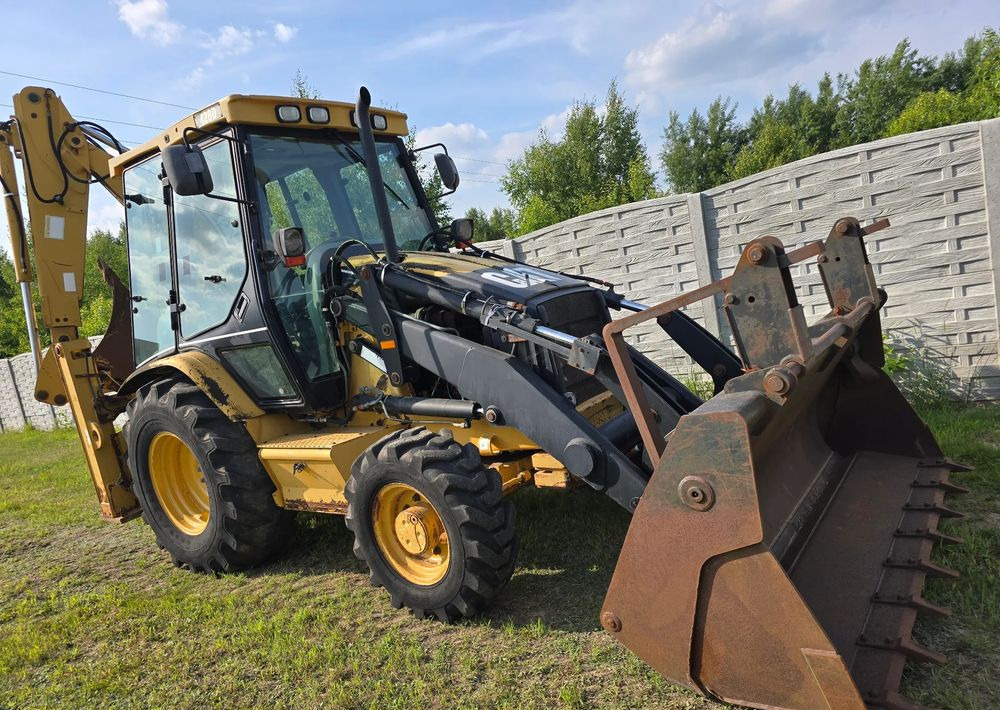 Caterpillar - Tractopelle: photos 5 Caterpillar - Tractopelle: photos 5