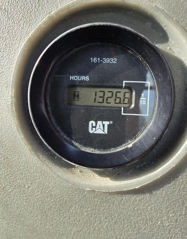 Caterpillar - Tractopelle: photos 4 Caterpillar - Tractopelle: photos 4