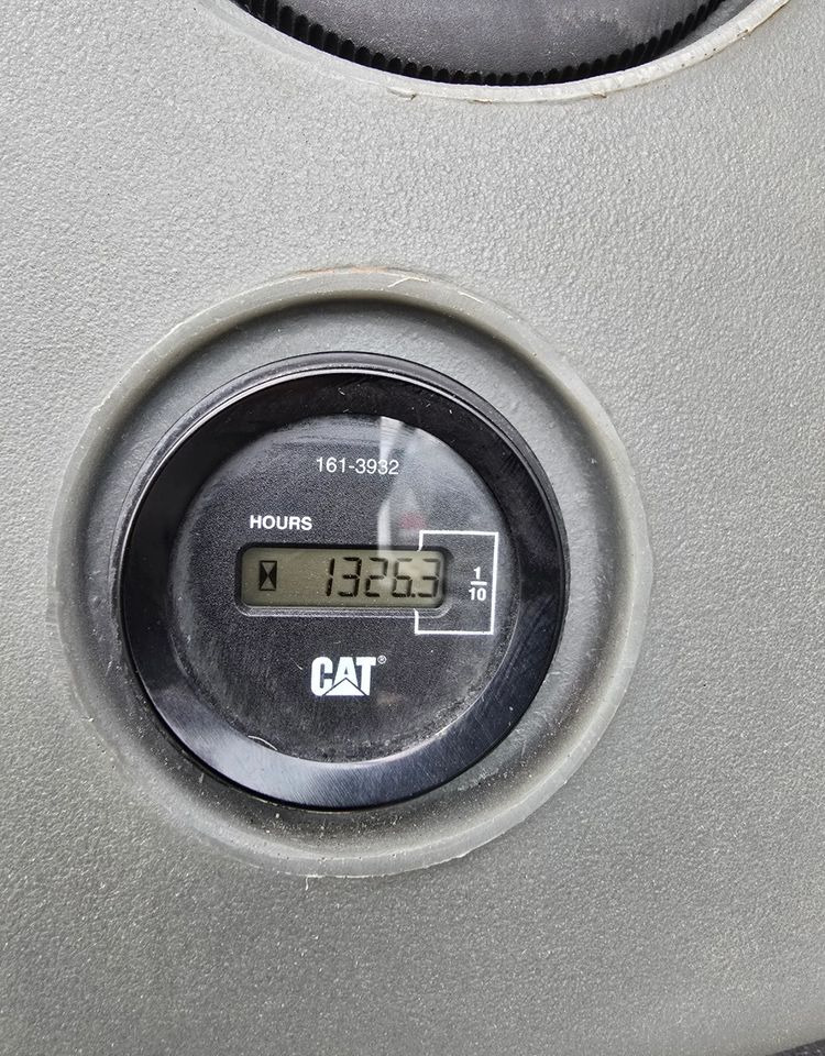 Caterpillar - Tractopelle: photos 3 Caterpillar - Tractopelle: photos 3