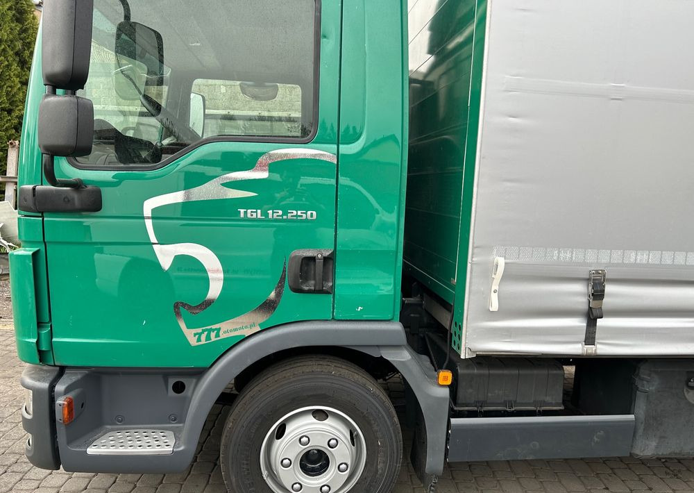 MAN TGL 12.250 6.2m AUTOMAT KLIMA z Niemiec ESP nowe opony EURO 6 / 4.75 rozstaw / zawiesie na wózek widłowy / TOP STAN / okazja nauka jazdy MOŻLIWOŚĆ DOSTOSOWANIA 12t - Camion à rideaux coulissants: photos 5 MAN TGL 12.250 6.2m AUTOMAT KLIMA z Niemiec ESP nowe opony EURO 6 / 4.75 rozstaw / zawiesie na wózek widłowy / TOP STAN / okazja nauka jazdy MOŻLIWOŚĆ DOSTOSOWANIA 12t - Camion à rideaux coulissants: photos 5