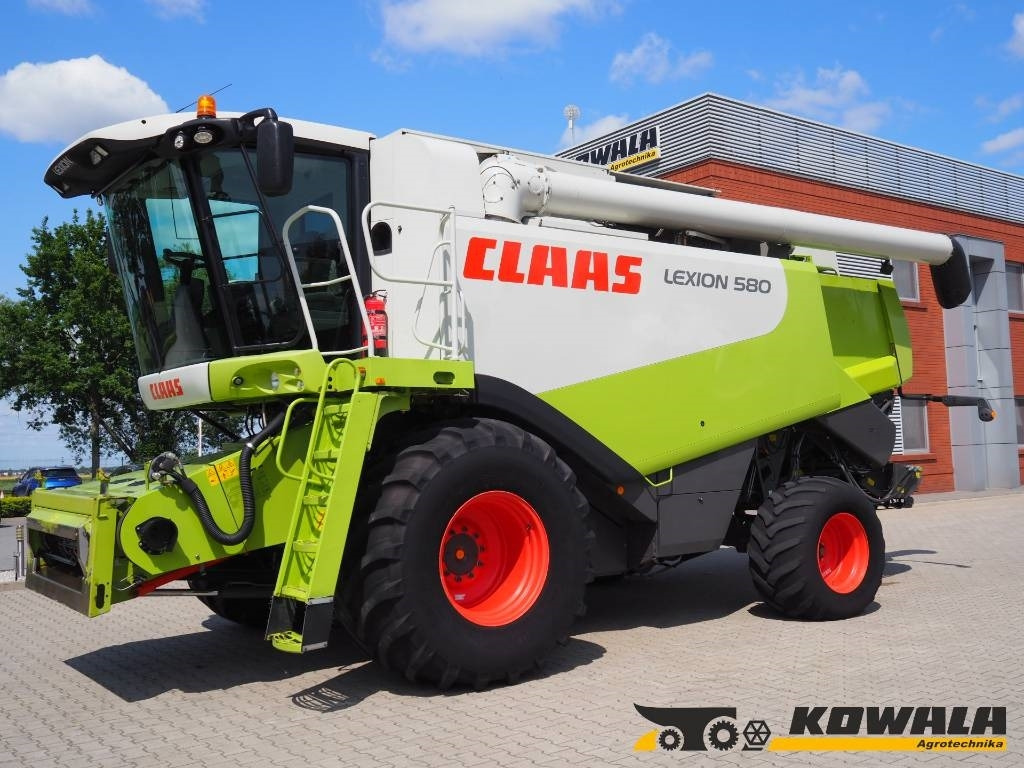 Claas Lexion 580 + V900 - Moissonneuse-batteuse: photos 1 Claas Lexion 580 + V900 - Moissonneuse-batteuse: photos 1