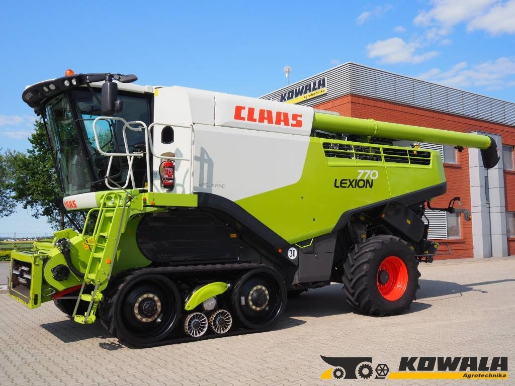 Claas Lexion 770TT + V1050 - Moissonneuse-batteuse: photos 1 Claas Lexion 770TT + V1050 - Moissonneuse-batteuse: photos 1